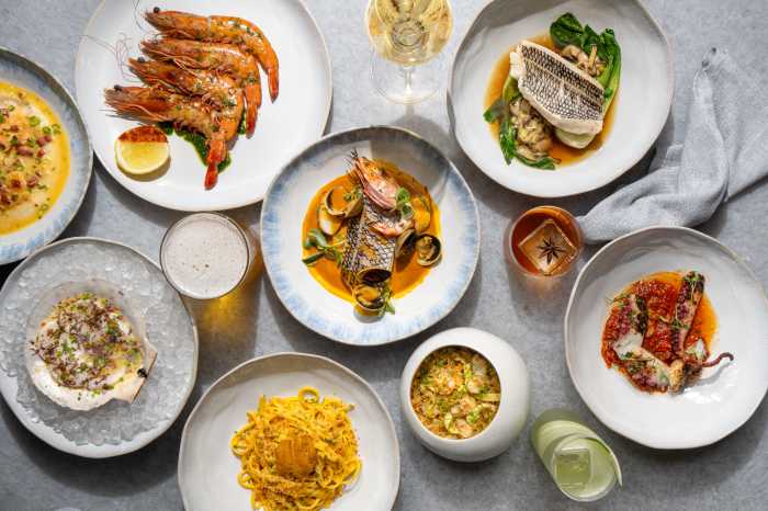 an array of seafood dishes from Midtown's Point Seven