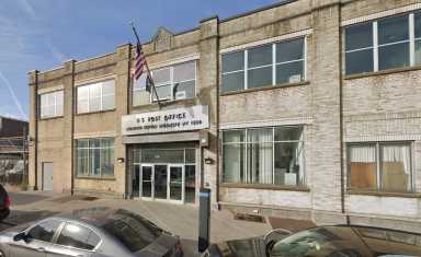 us post office building with cars parked in front in Brooklyn