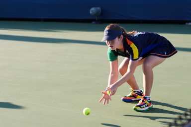 A member of the US Open ball crew during a junior wheelchair girls' doubles semifinal match at the 2024 US Open on Thursday, Sep. 5, 2024 in Flushing, NY. (Manuela Davies/USTA)