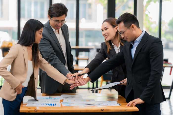 Workers gathered in a Top Workplace