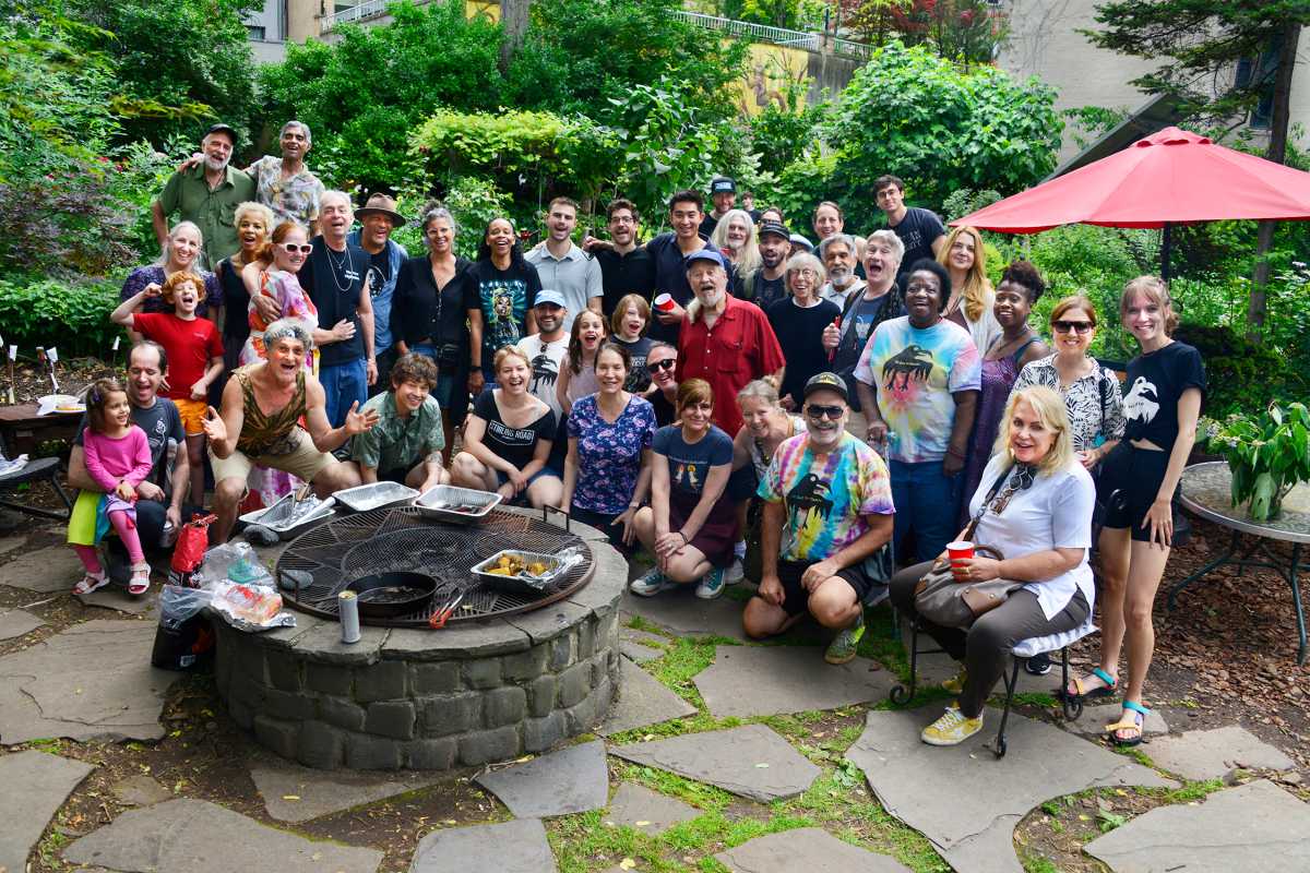 People gathered at community garden in East Village