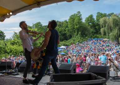 Hudson River Music festival singers before big crowd