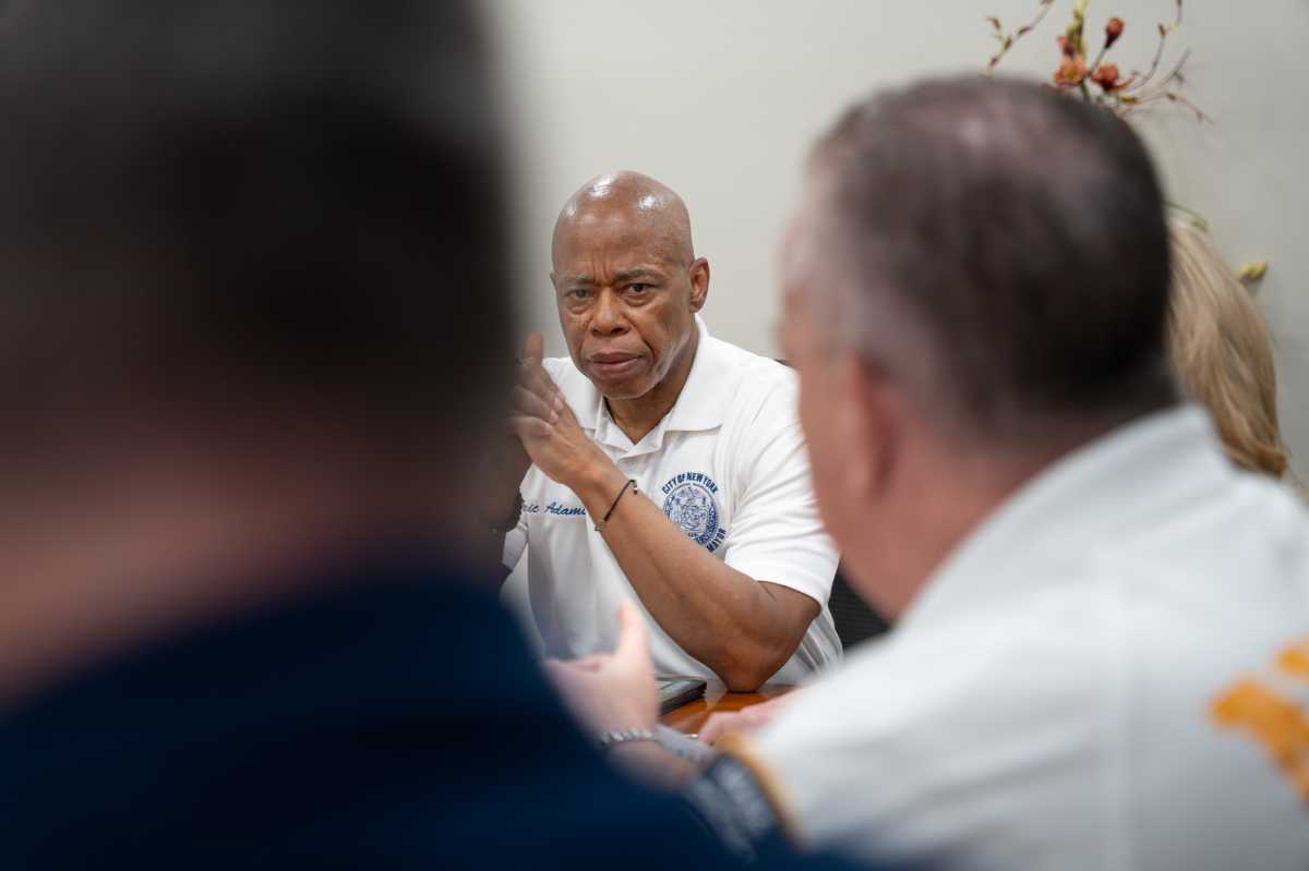 Mayor Eric Adams pictured visiting an off-duty federal law enforcement officer shot inside a Manhattan Park over the weekend