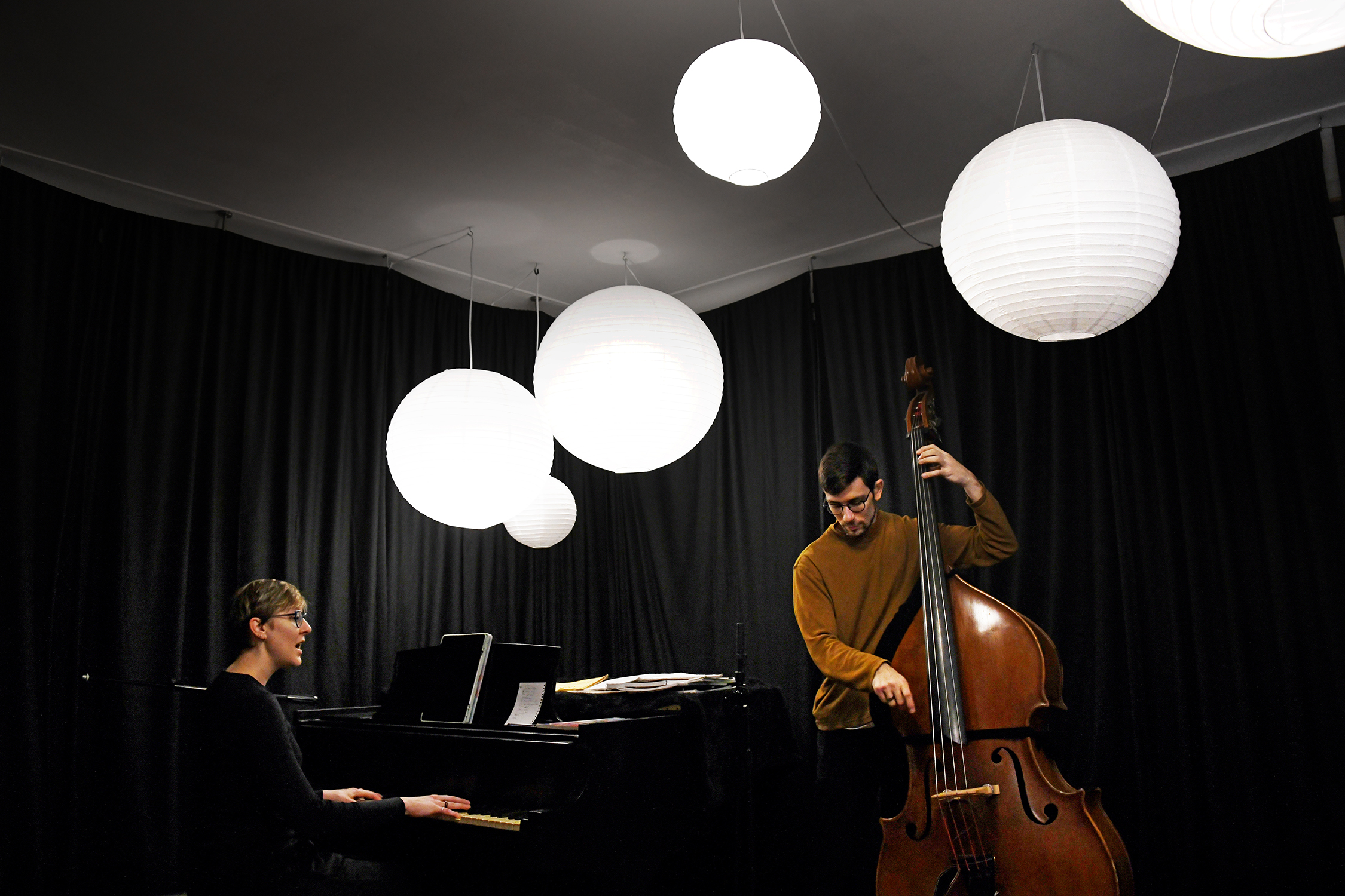 Kelly Green and Luca Soul Rosenfeld playing in their living room in Forest Hills