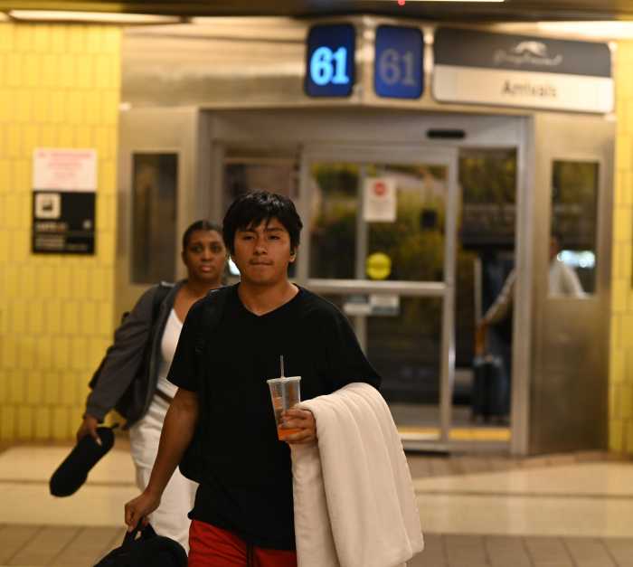 Derlis walks into the Port Authority Bus Terminal on July 18, returning home to New York after spending over a month in ICE detention in Texas
