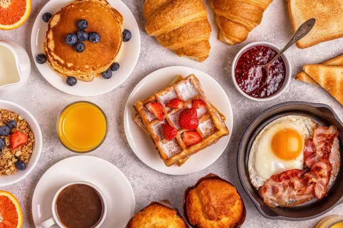 Delicious breakfast on a light table. Top view, copy space.