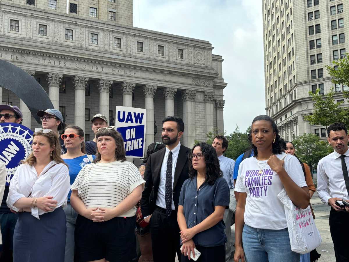 Making their case: NYC public interest attorneys rally for higher pay as hundreds go on strike 2 Zohran Mamdani stands with a group at a union rally.