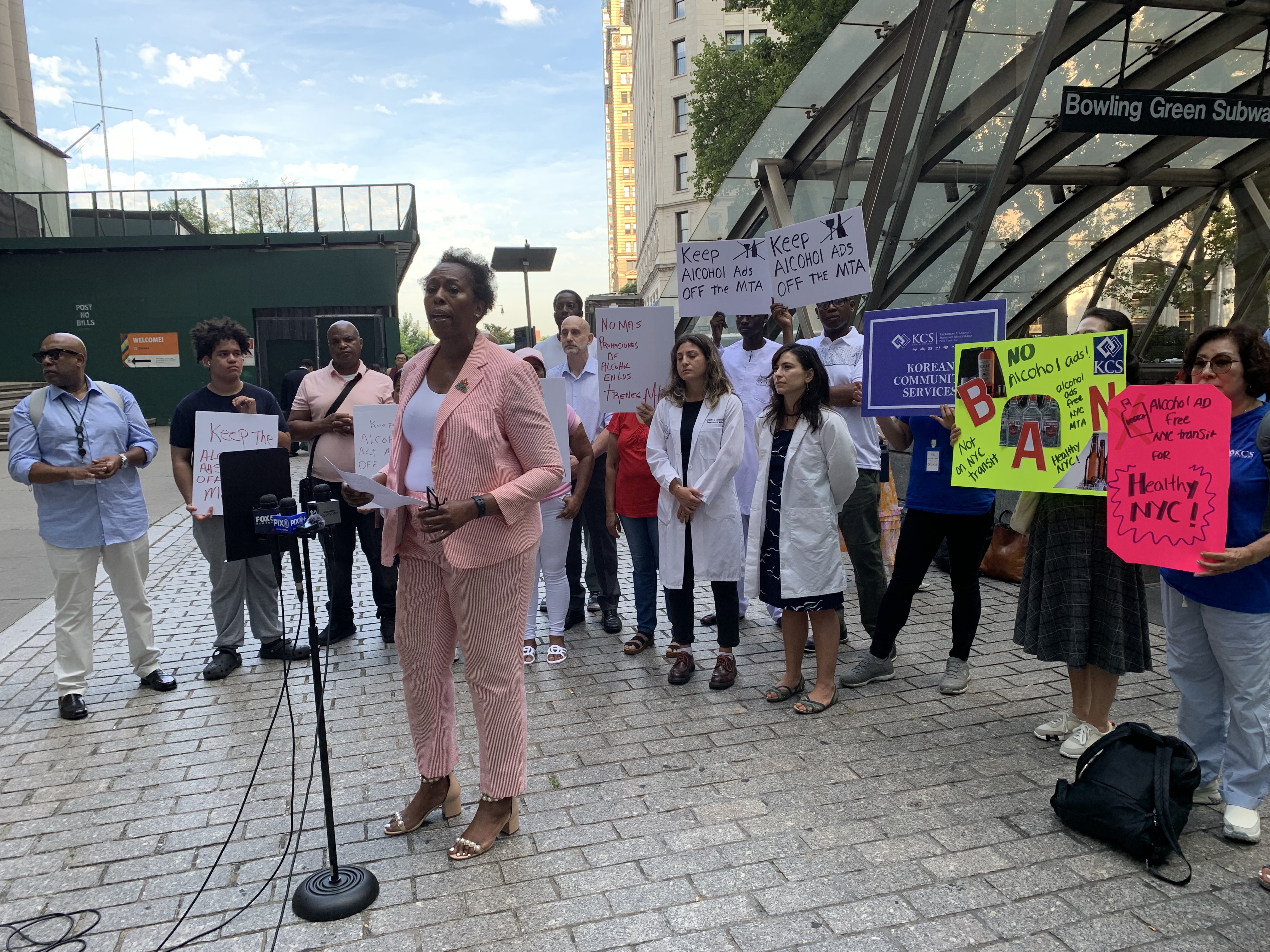Why these New Yorkers are telling the MTA to keep alcohol ads out of public transit 2 protesters in lower manhattan