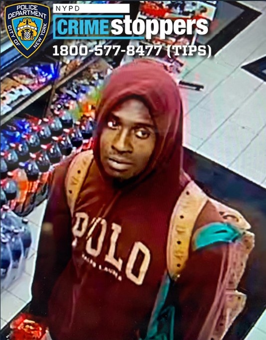 Suspect in red polo shirt wanted for setting fire to dog in Queens