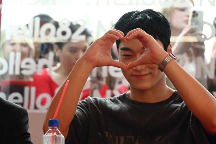 SAN of ATEEZ at a surprised listening party in Soho.