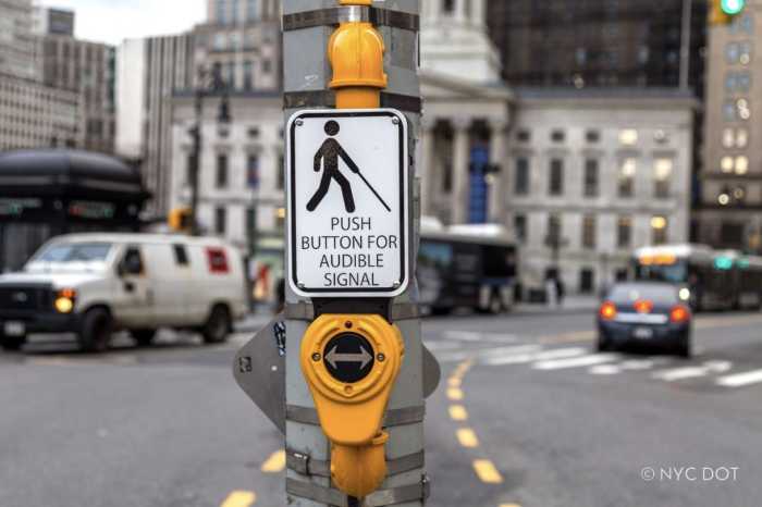 New DOT report: How NYC streets and sidewalks are undergoing an accessibility makeover 2 a traffic signal on a NYC street