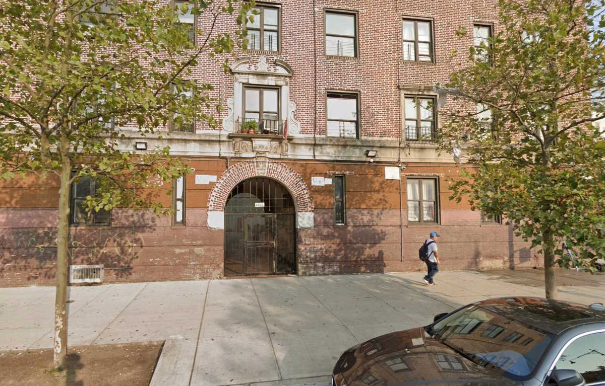 Apartment building and street in the Bronx where woman was stabbed dead