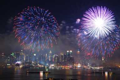 fireworks over the Manhattan skyline on the Fourth of July