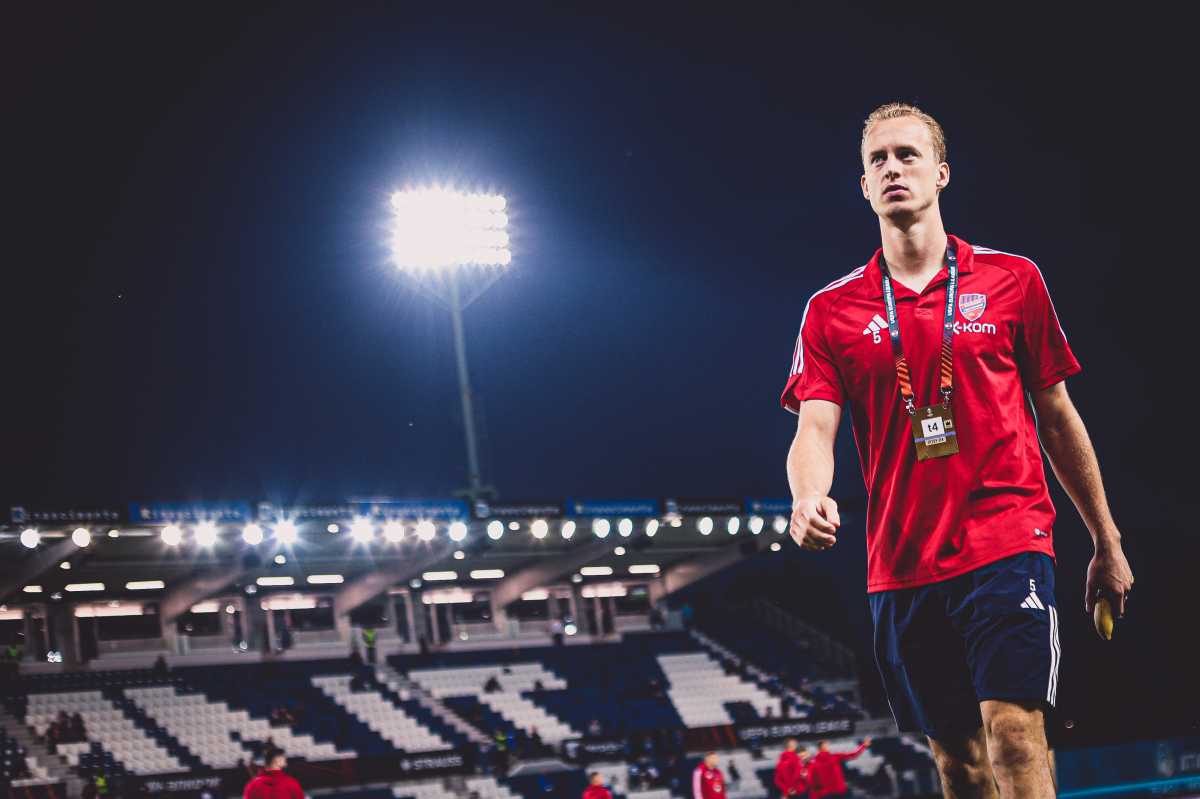 Gustav Berggren Red Bulls: Soccer player in red uniform and black shorts walks off field