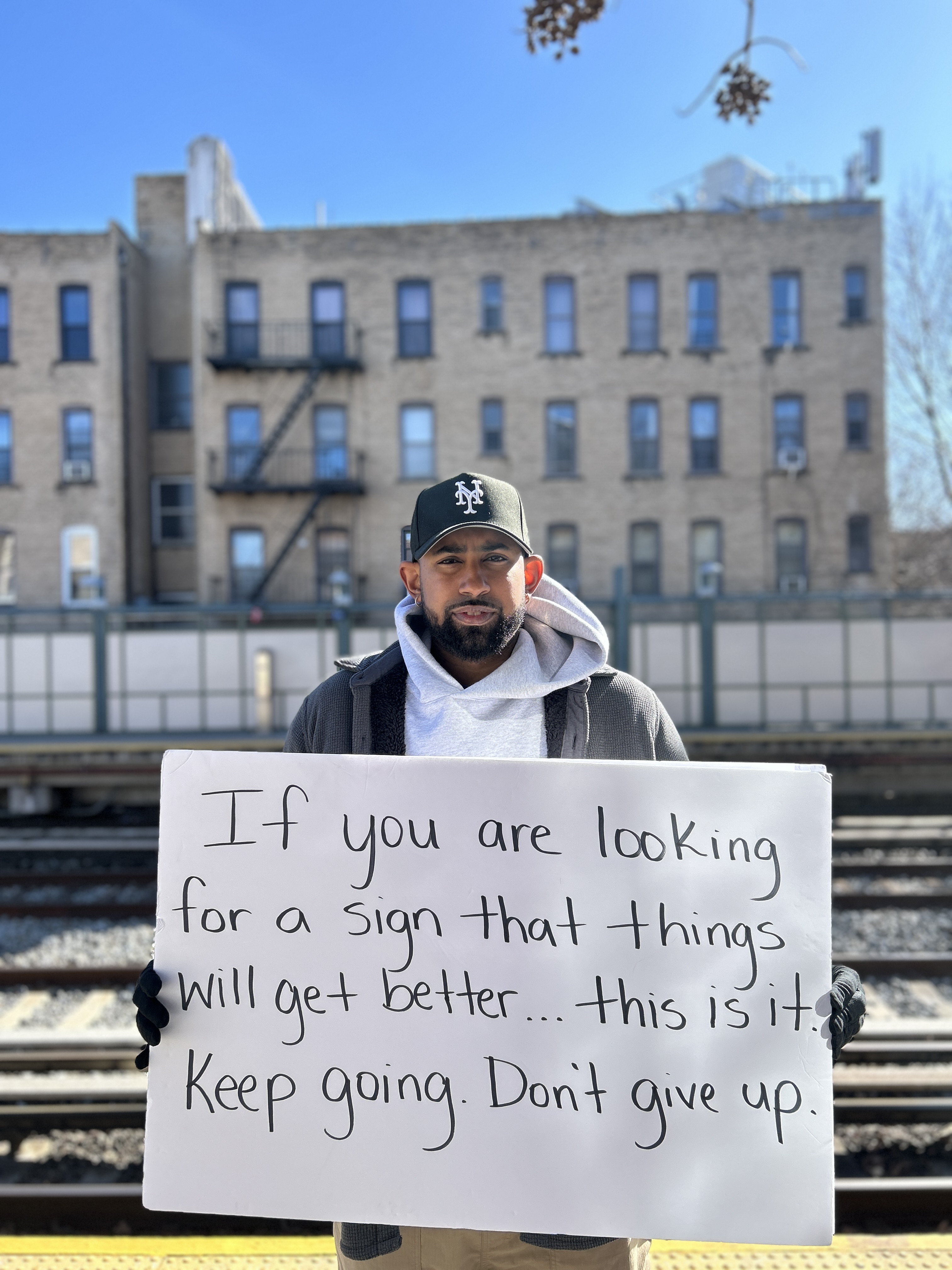 Spreading love, one sign at a time: Jose Cruz’s World Needs Love Tour takes over NYC 3