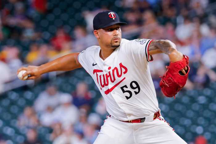 Jhoan Duran Mets Yankees: Baseball player throws ball in white uniform