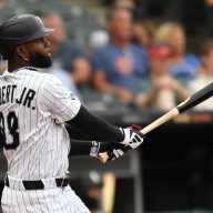 Mets trade rumors: Luis Robert Jr. pursuit continues 10 Luis Robert Jr. Mets trade: Baseball player in white uniform and black helmet watches ball after swinging bat