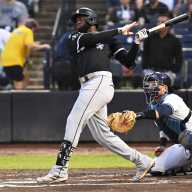 Mets acquire Luis Robert Jr., take low-risk, high-reward swing with former All-Star 14 Luis Robert Jr. White Sox Mets: Baseball player in black uniform swings bat