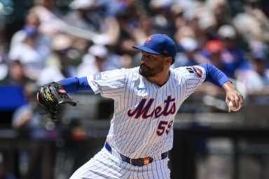 Sean Manaea: Man in Mets uniform throwing baseball