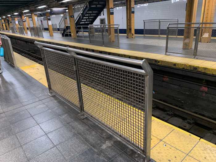 Last month was the "safest" July in NYC subway history, MTA says 2 a subway station with protective barriers