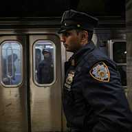 Subway crime hit a record low in October, NYPD says 16 cop on a subway platform