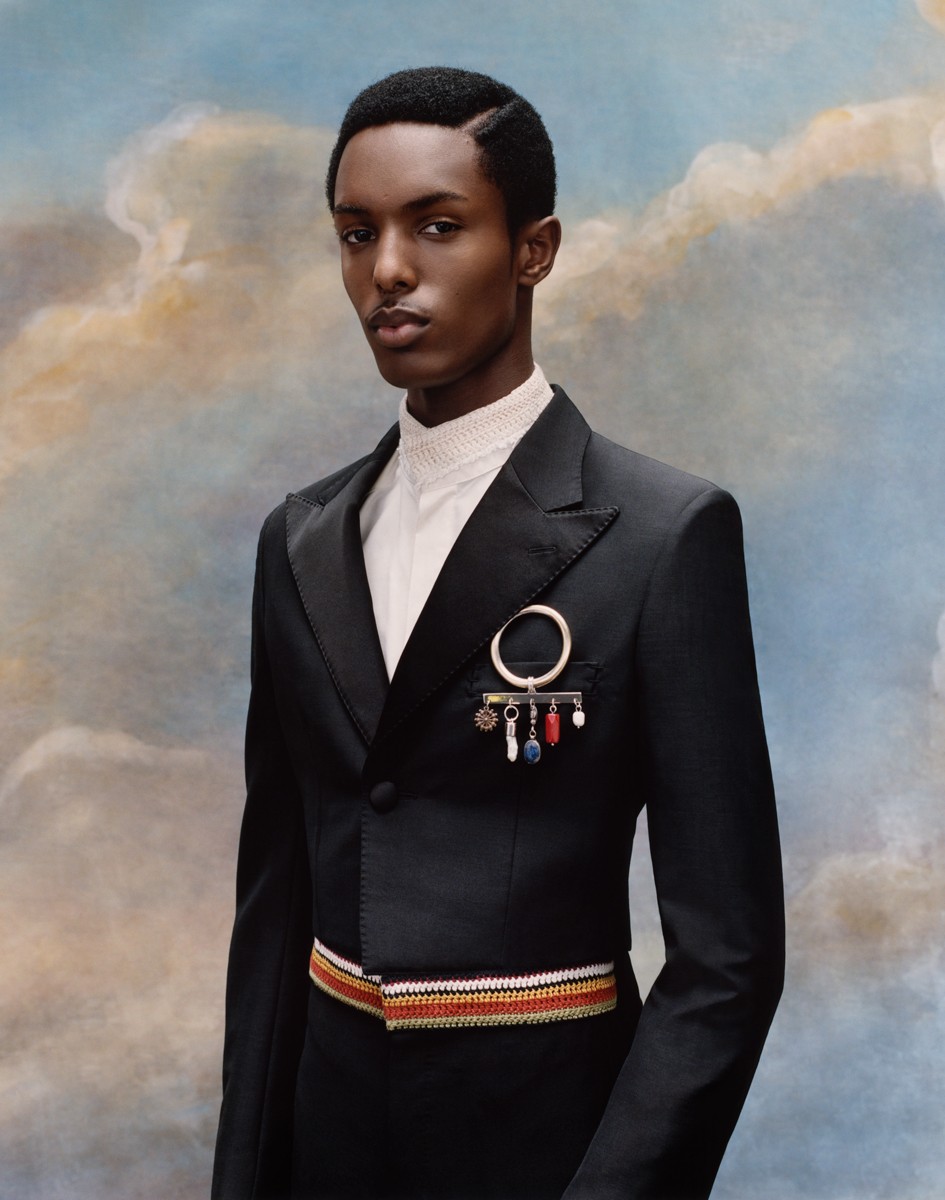 portrait of well dressed man in superfine exhibit
