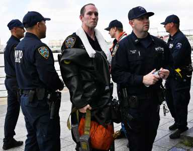 First responders in uniform and wet after Hudson River water rescue
