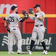 3 big questions surrounding Yankees at start of spring training 11 Aaron Judge Cody Bellinger Yankees: 2 baseball players high five in outfield