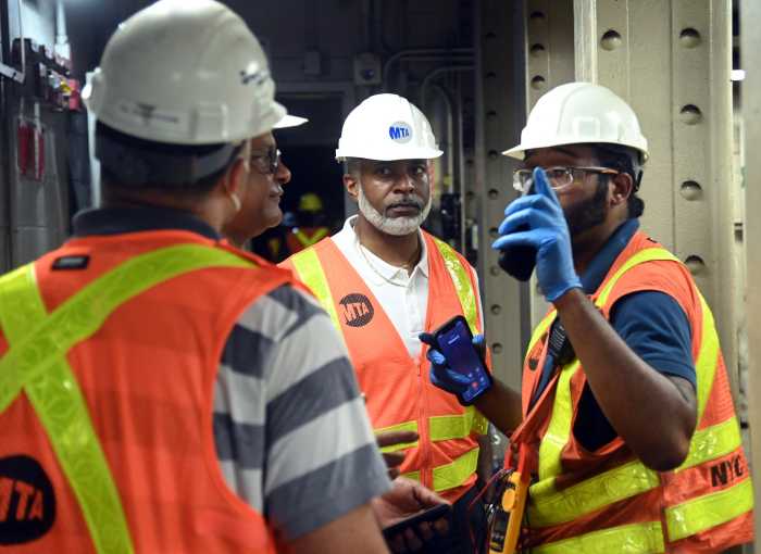 workers on the subway line after an outage