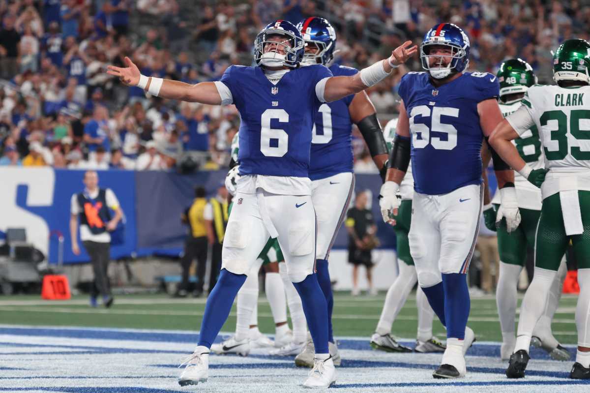 Jaxson Dart of Giants celebrating touchdown in preseason game