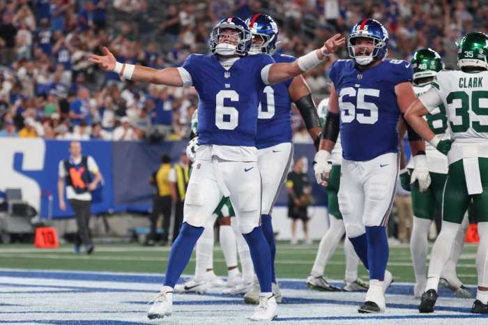 Jaxson Dart of Giants celebrating touchdown in preseason game