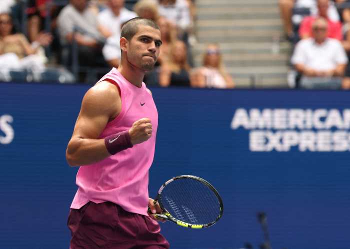 Spain's Carlos Alcaraz reacts during his third round match against Italy's Luciano Darderi