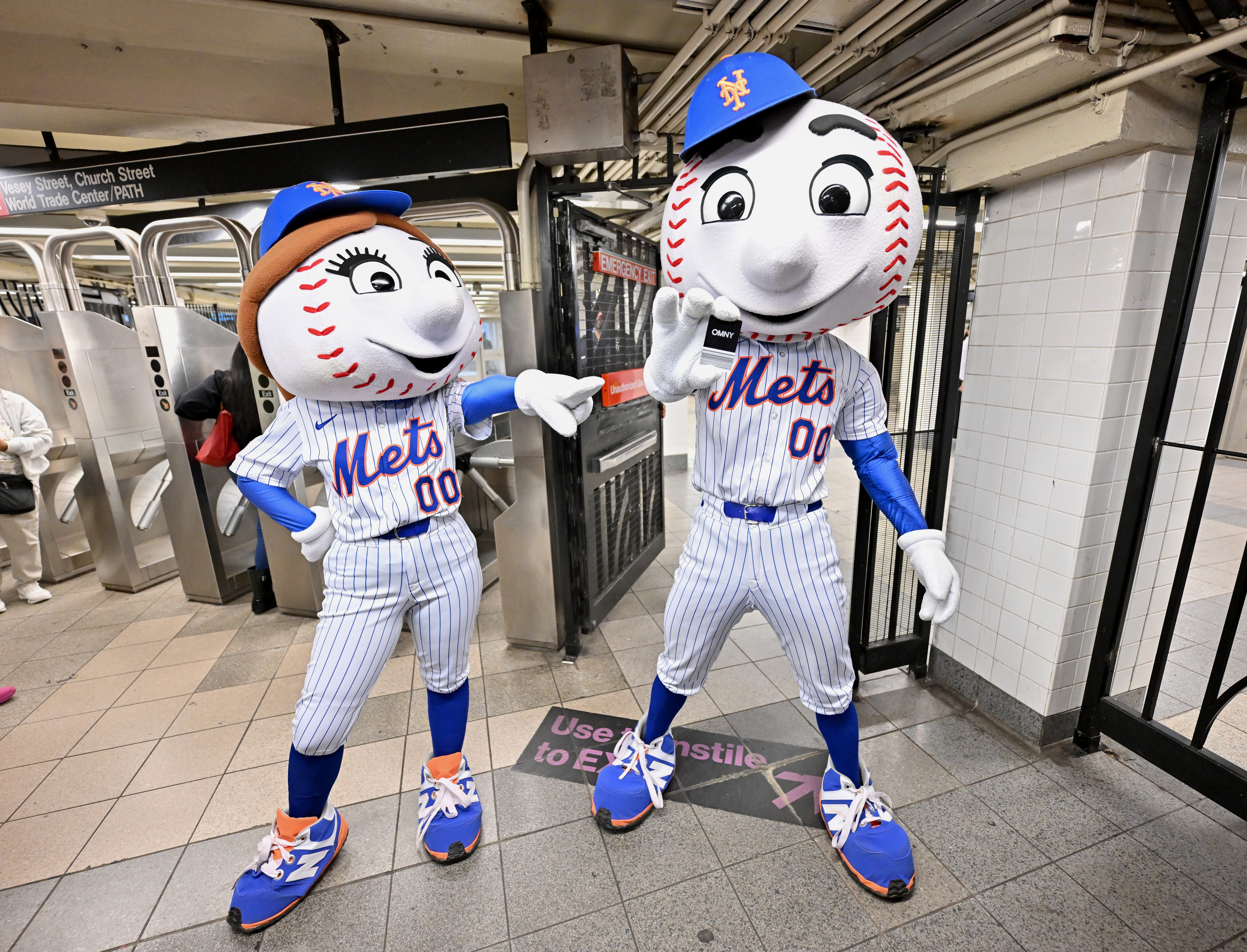 Mrs. Met and Mr. Met join ESPN to celebrate the launch of the new ESPN app with a "E" train takeover on August 21, 2025 in New York City. 
