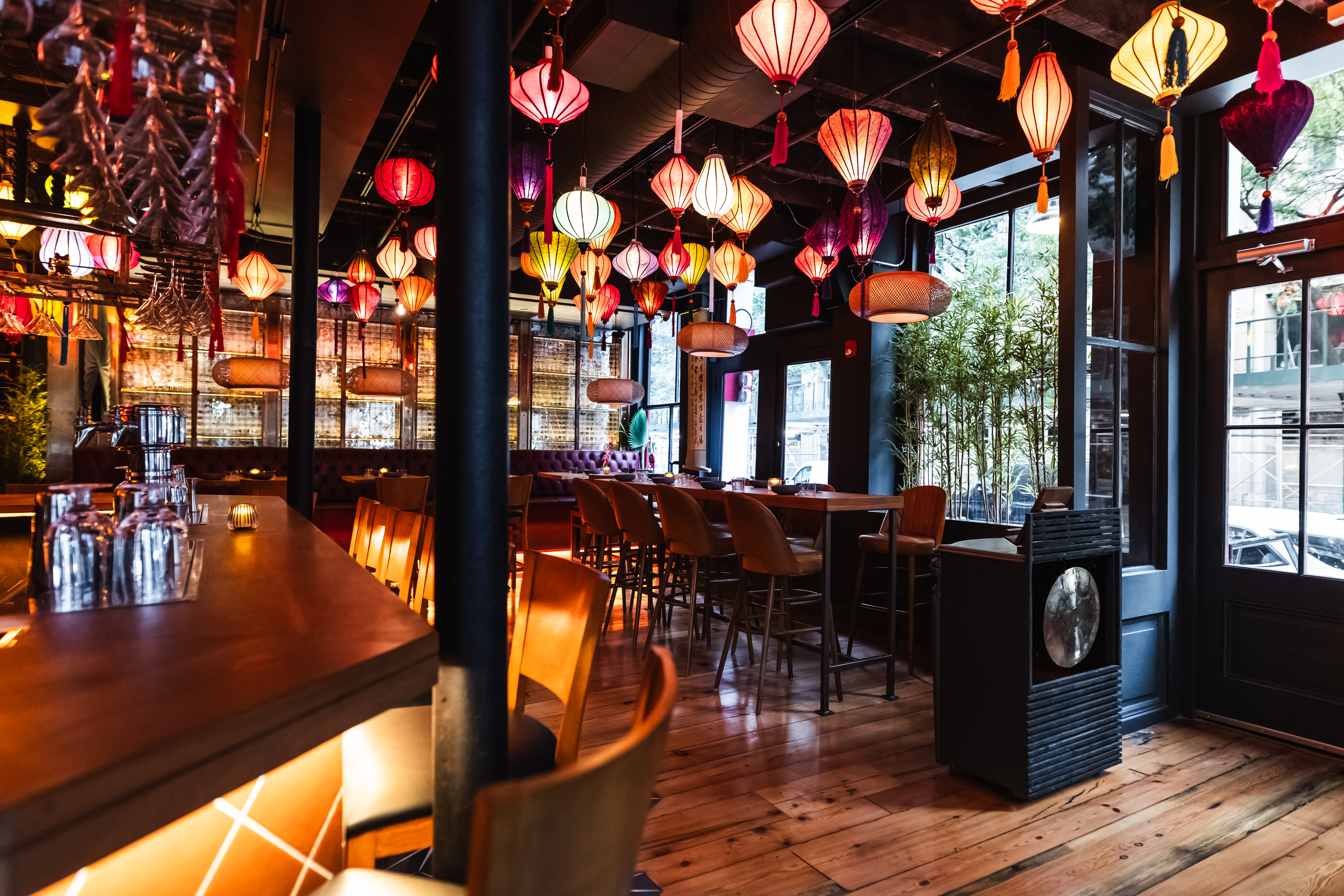 Lucky Tiger Brings multi-room dining and cocktails to the heart of FiDi 2 The interior at Lucky Tiger with lanterns hanging from the ceiling.