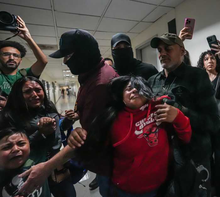 ICE agents pull away man from his family