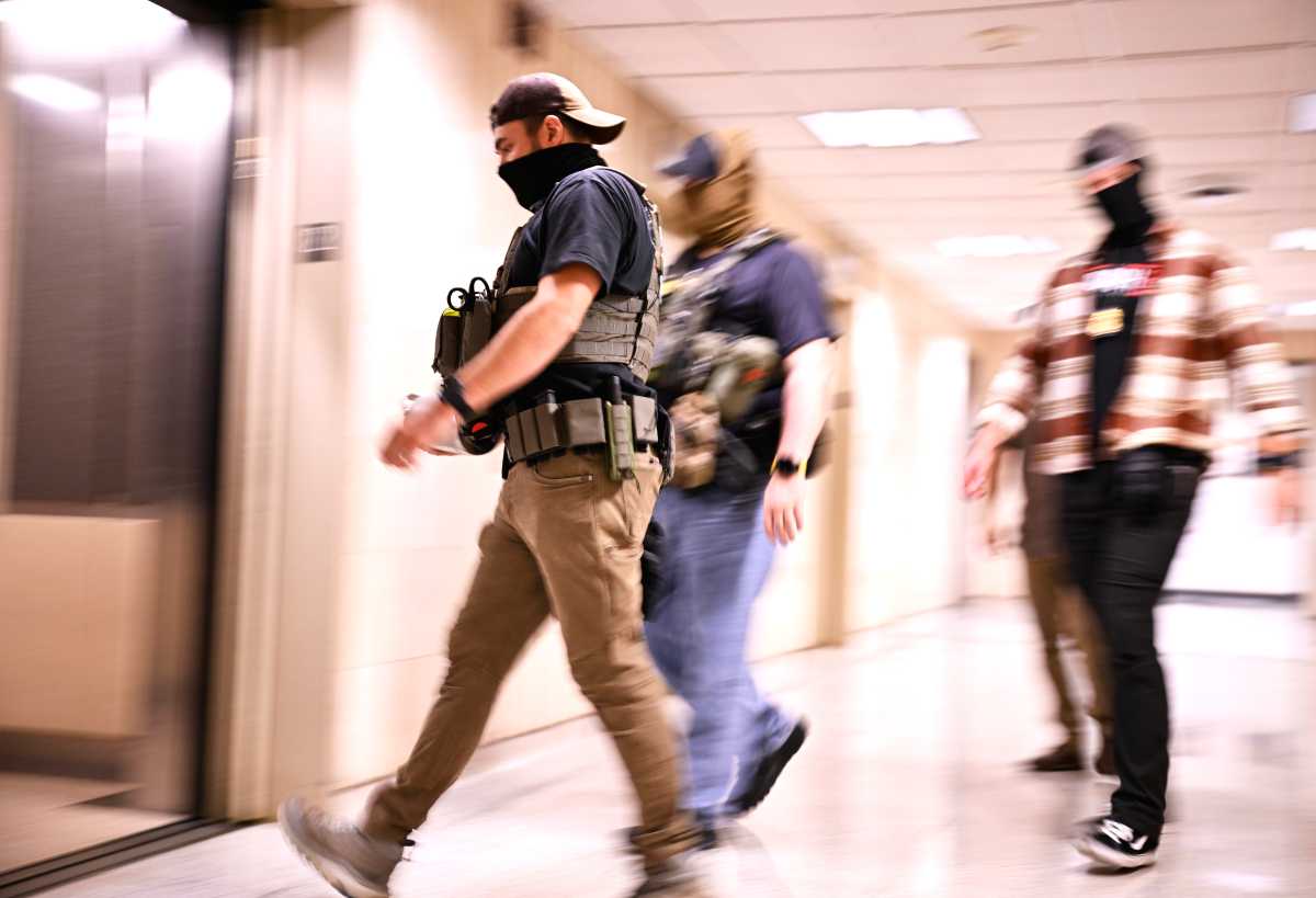ICE Agents leave the 12th floor.