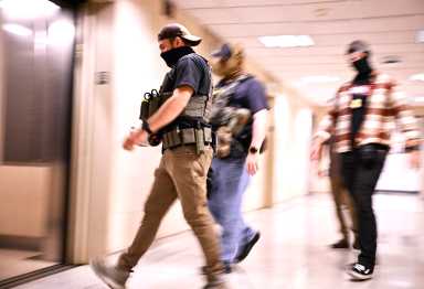 ICE Agents leave the 12th floor.