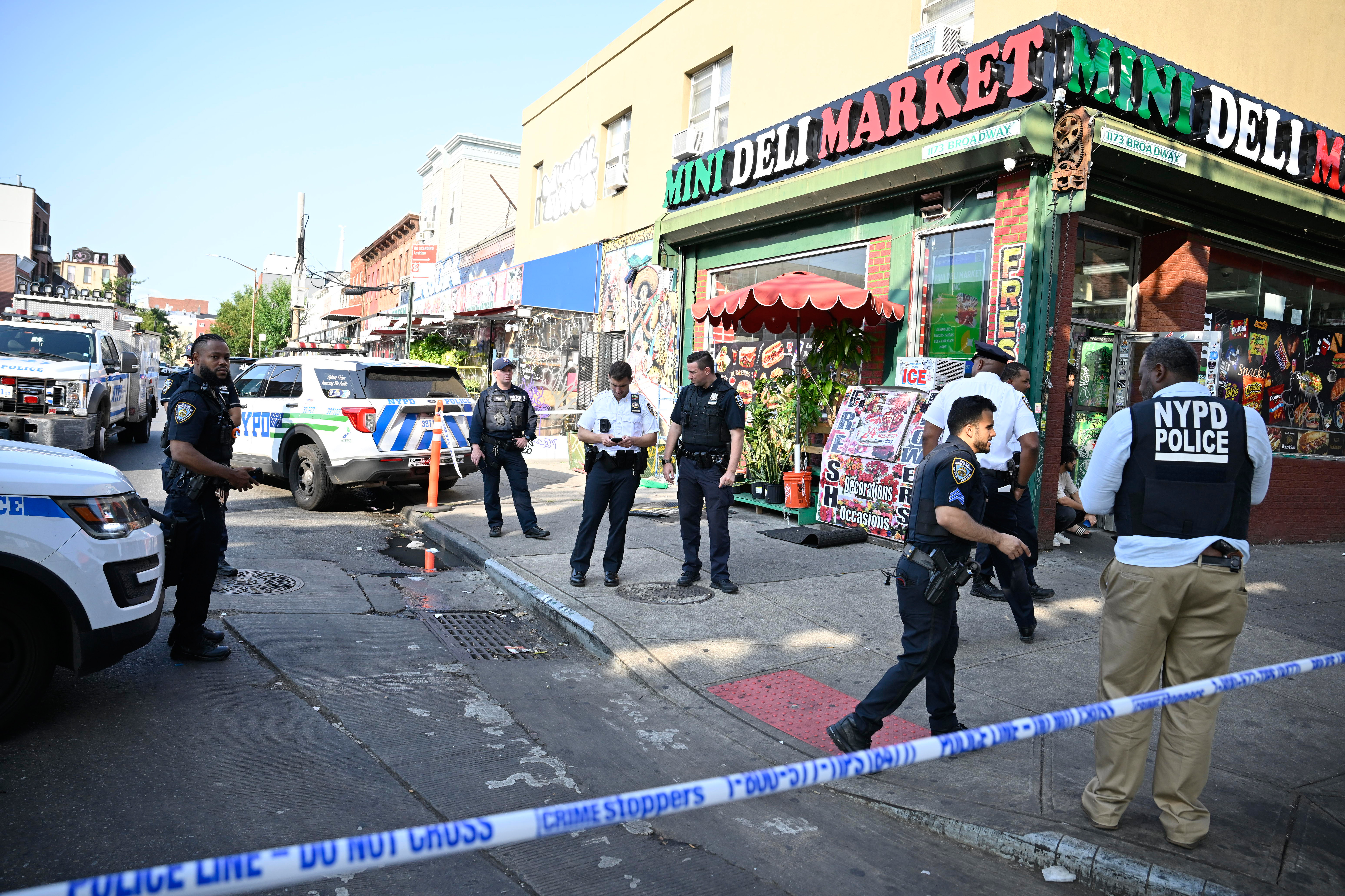 Detectives from the 83 Precinct investigate a shooting at Broadway Avenue and Kossuth Place. The victim was left in critical condition.