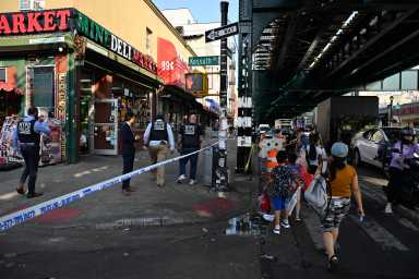 Detectives from the 83 Precinct investigate a shooting at Broadway Avenue and Kossuth Place. The victim was left in critical condition.