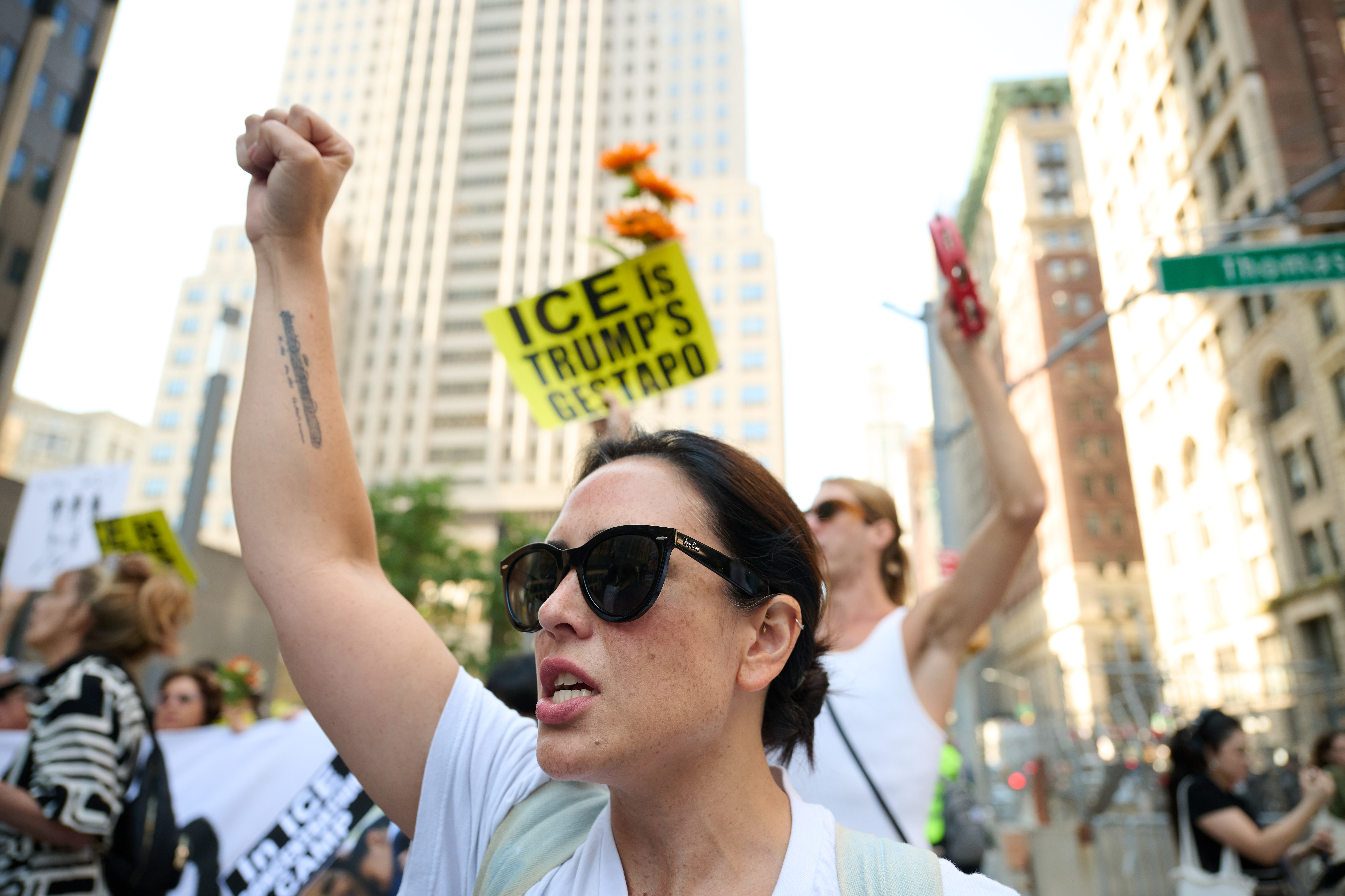 People protest ICE at 26 Federal Plaza.
