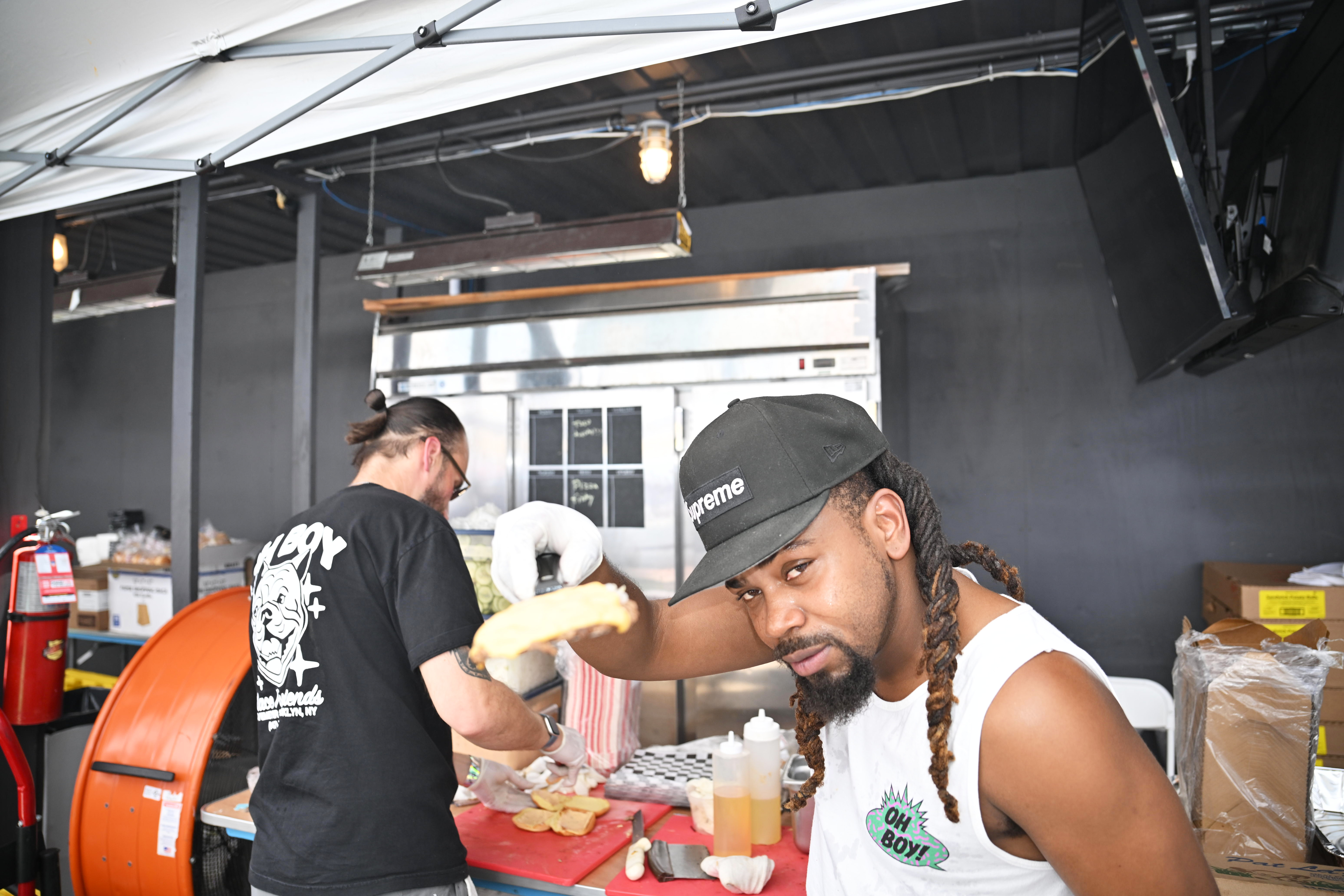 Burgers are prepared at Kel's Burger Fest.