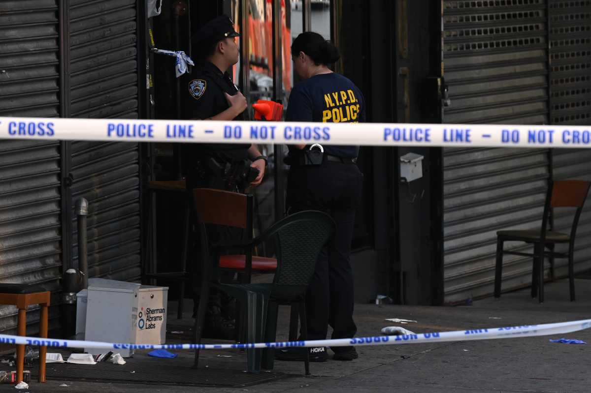 police comb through evidence at scene of Brooklyn mass shooting