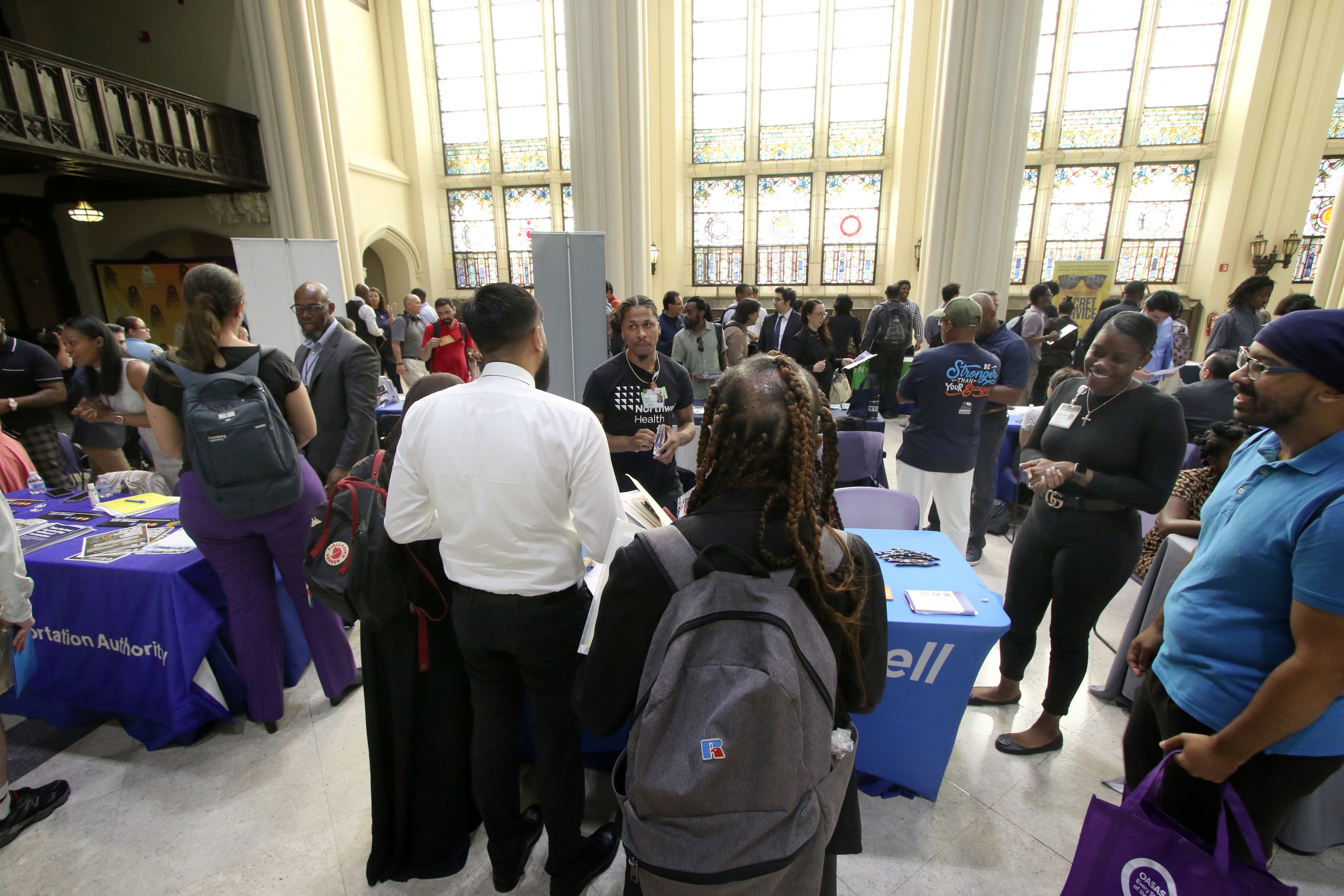 people attending the NYC Jobs & Career Fair at Harlem Week