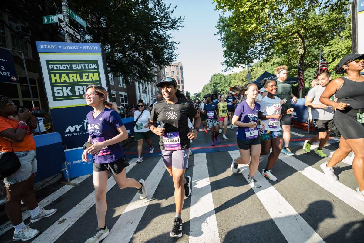 Run for the Future participates alongside adults in the Percy Sutton Harlem 5K in Harlem, NY. (Photo by Carla G. Torres for NYRR)