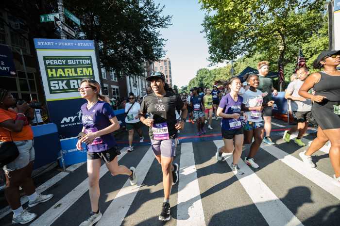 Run for the Future participates alongside adults in the Percy Sutton Harlem 5K in Harlem, NY. (Photo by Carla G. Torres for NYRR)