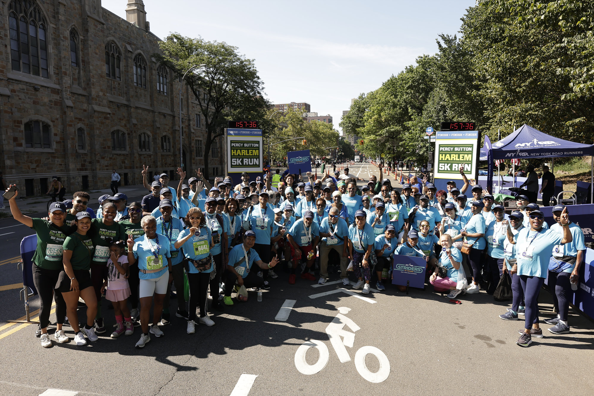 August 9, 2025: The NYRR Striders participate in the 2025 Percy Sutton Harlem 5K in Harlem, New York City. (Photo by Adam Hunger for NYRR)