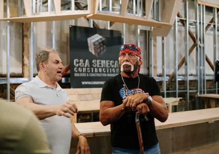 Hulk Hogan’s son unveils tribute banner on dad’s birthday ahead of Midtown bar opening 2 Hulk Hogan pictured on his last visit to the under-construction Slam Sports Bar in Midtown with business partner Rich Rosen in April.