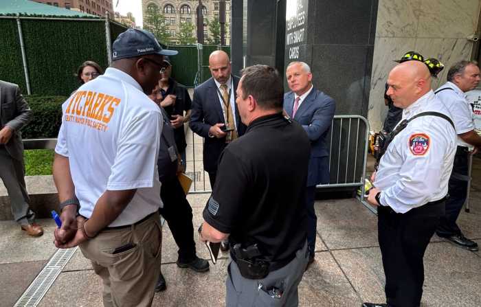 police and federal agents at scene where white powder was found in Lower Manhattan