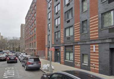 A view of 306 West 128th Street in Harlem, where a 51-year-old man was fatally stabbed Friday.
