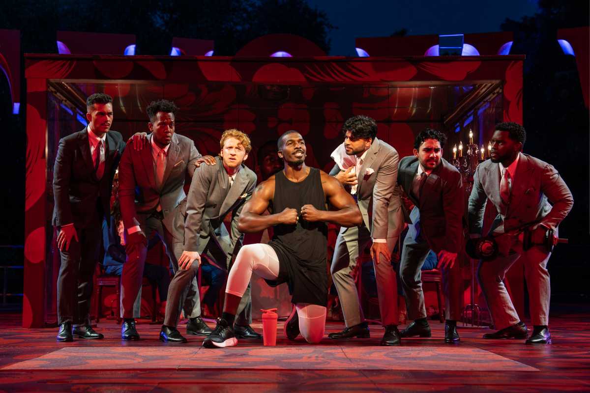 Khris Davis (center) and members of the ensemble in the Free Shakespeare in the Park production of 'Twelfth Night,' directed by Saheem Ali, which has reopened the revitalized Delacorte Theater and runs through Sept. 14.